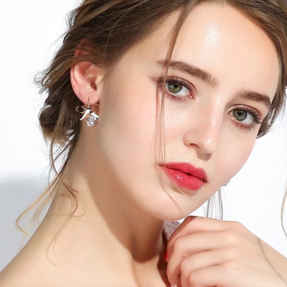 3/$30 Silver Bow Drop Earrings - Picture 4 of 8